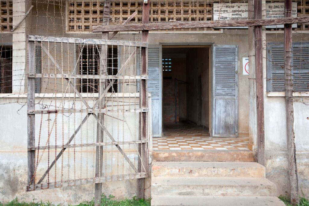 The barbed wired doors of Tuol Sleng in Cambodia