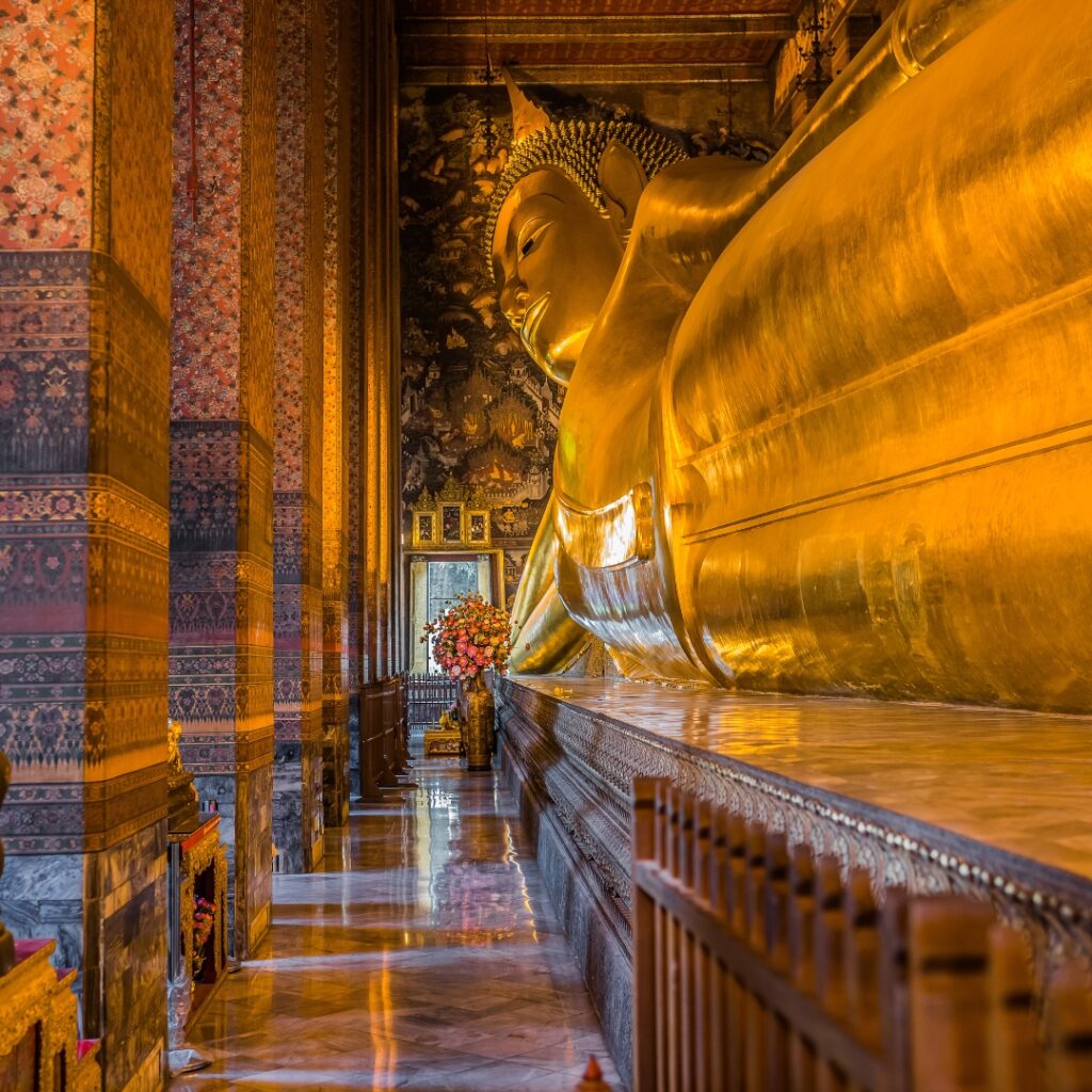 Massive reclining buddha at Wat Pho, Bangkok, Thailand